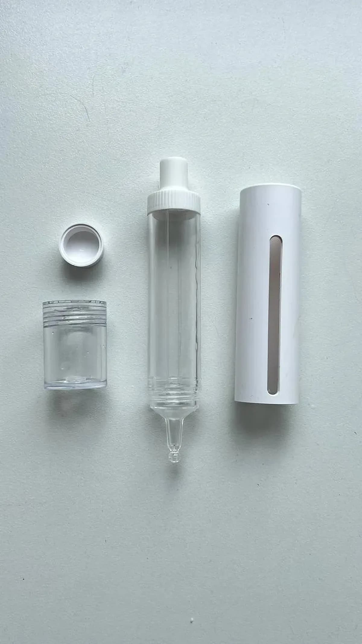 Bacillus F applicator pen components — cap, sleeve and cartridge