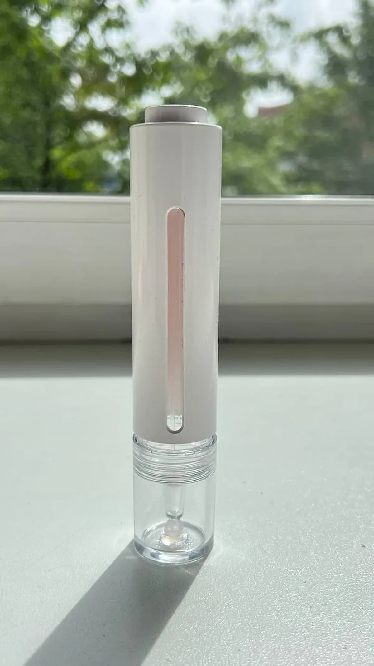 Bacillus F postbiotic drops bottle with fill window, daylight
